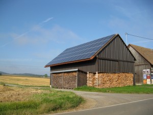 A barn, covered in solar panels