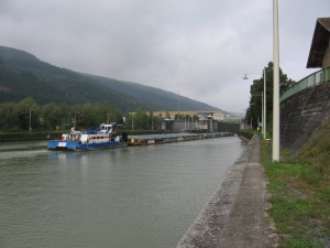A barge going upstream through the locks