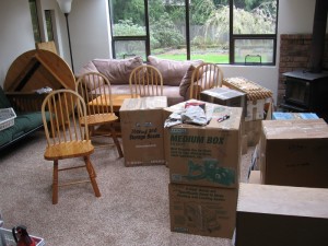 Chaos of boxes in the old sun room