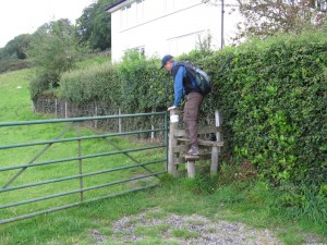 Randy climbing a stile