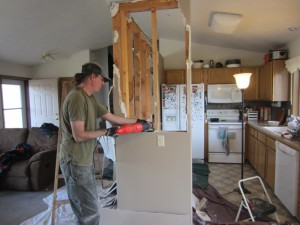 sawing studs in wall
