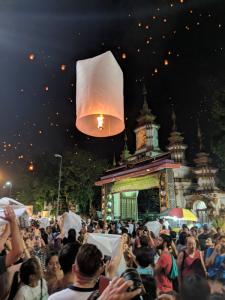 Sky lanterns being released into the air